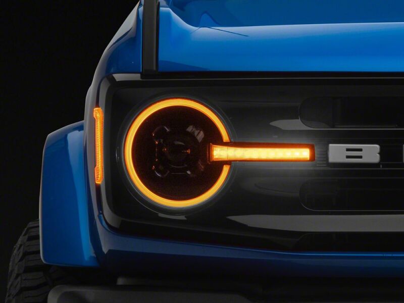 Raxiom 21-26 Ford Bronco LED Halo Headlights with Amber Backlight- Black Housing- Clear Lens