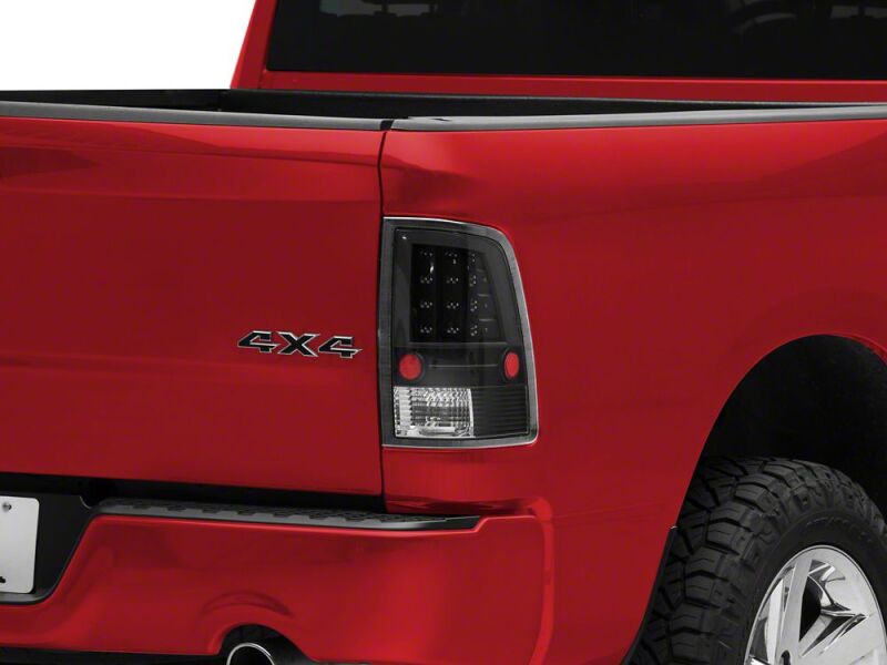 Raxiom 09-18 Dodge RAM 1500 LED Tail Lights- Black Housing- Clear Lens