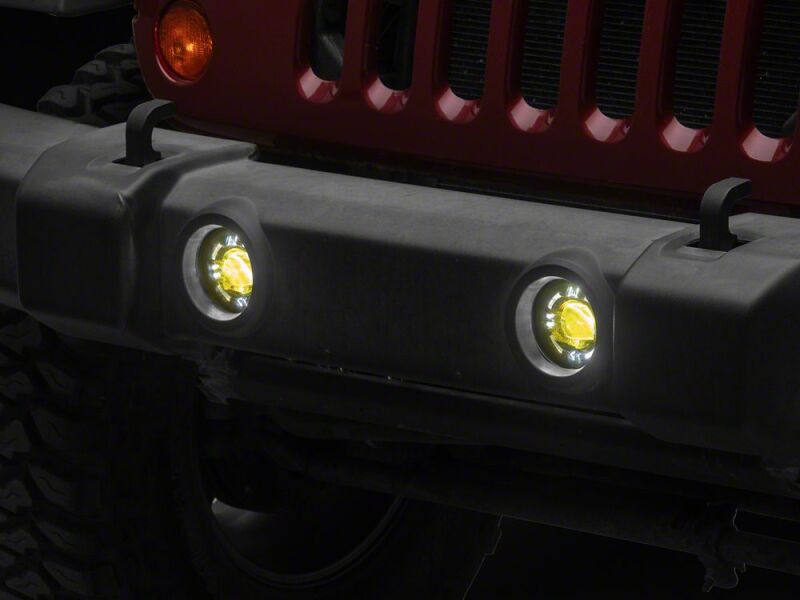 Raxiom 07-18 Jeep Wrangler JK V2 LED Switchback Fog Lights with Amber Turn Signal and Halo Rings