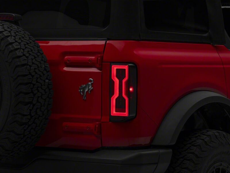 Raxiom 21-26 Ford Bronco Axial Series LED Tail Lights- Black Housing- Smoked Lens