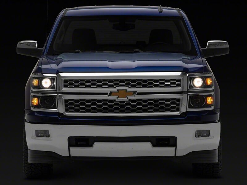 Raxiom 14-15 Chevrolet Silverado 1500 OE Projector Headlights/Chrome Trim- Black- Clear Lens