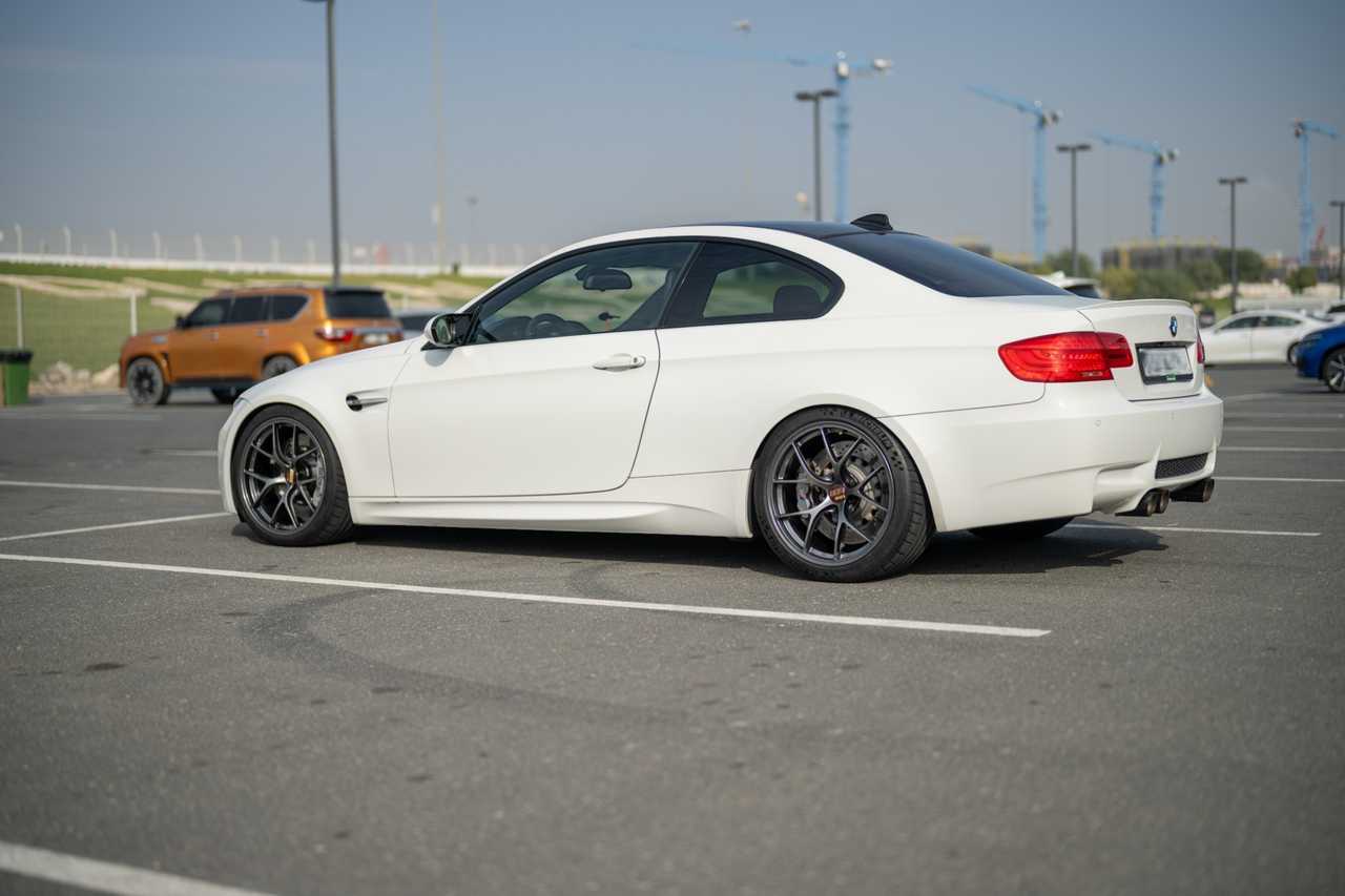 White tuned BMW M3 E92 coupe – side view | ATOMIC-SHOP