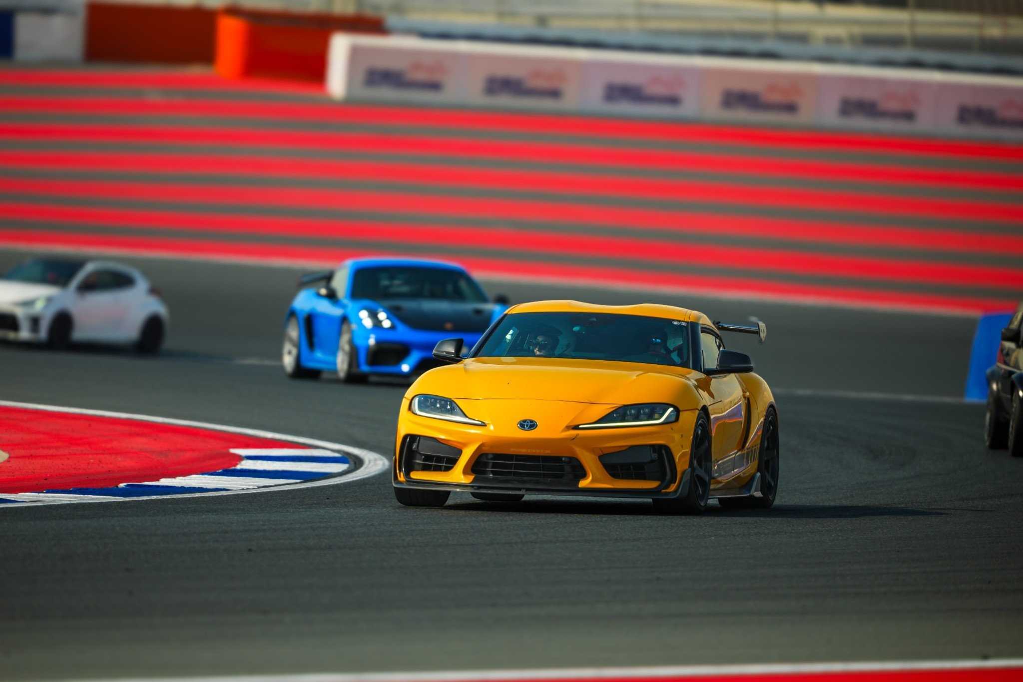 Yellow TOYOTA SUPRA GR on the track | ATOMIC-SHOP