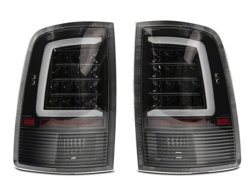 Raxiom 09-18 Dodge RAM 1500 Axial Series LED Tail Lights- Black Housing- Clear Lens