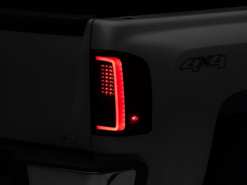 Raxiom 07-13 Chevrolet Silverado 1500 G2 LED Tail Lights- Black Housing- Smoked Lens