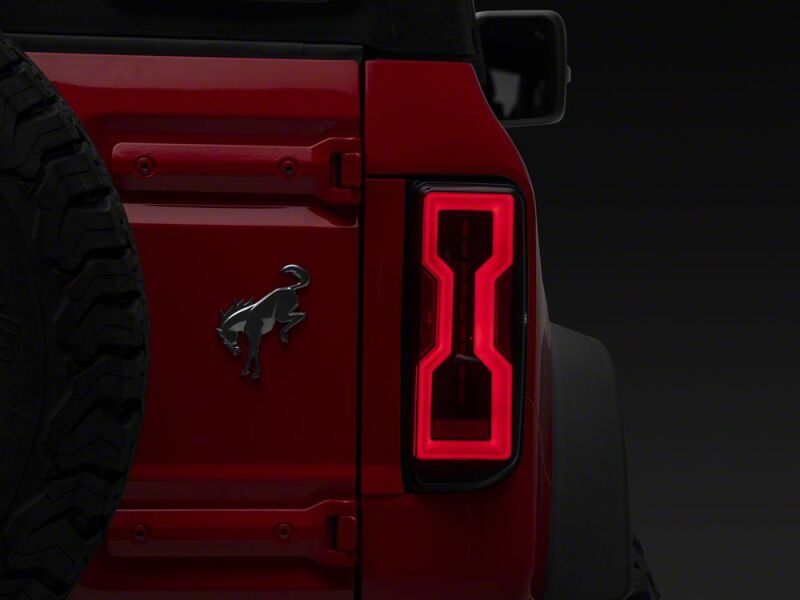 Raxiom 21-26 Ford Bronco Axial Series LED Tail Lights- Black Housing- Smoked Lens