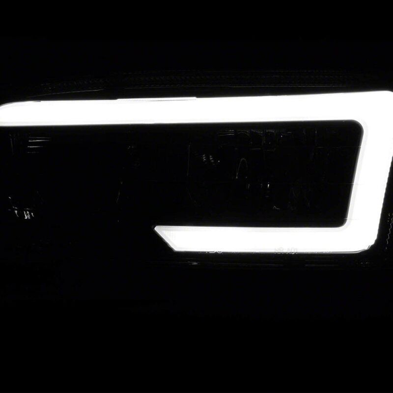 Raxiom 99-06 Chevrolet Sierra 1500 Axial Series LED DRL Headlights- Black Housing- Clear Lens